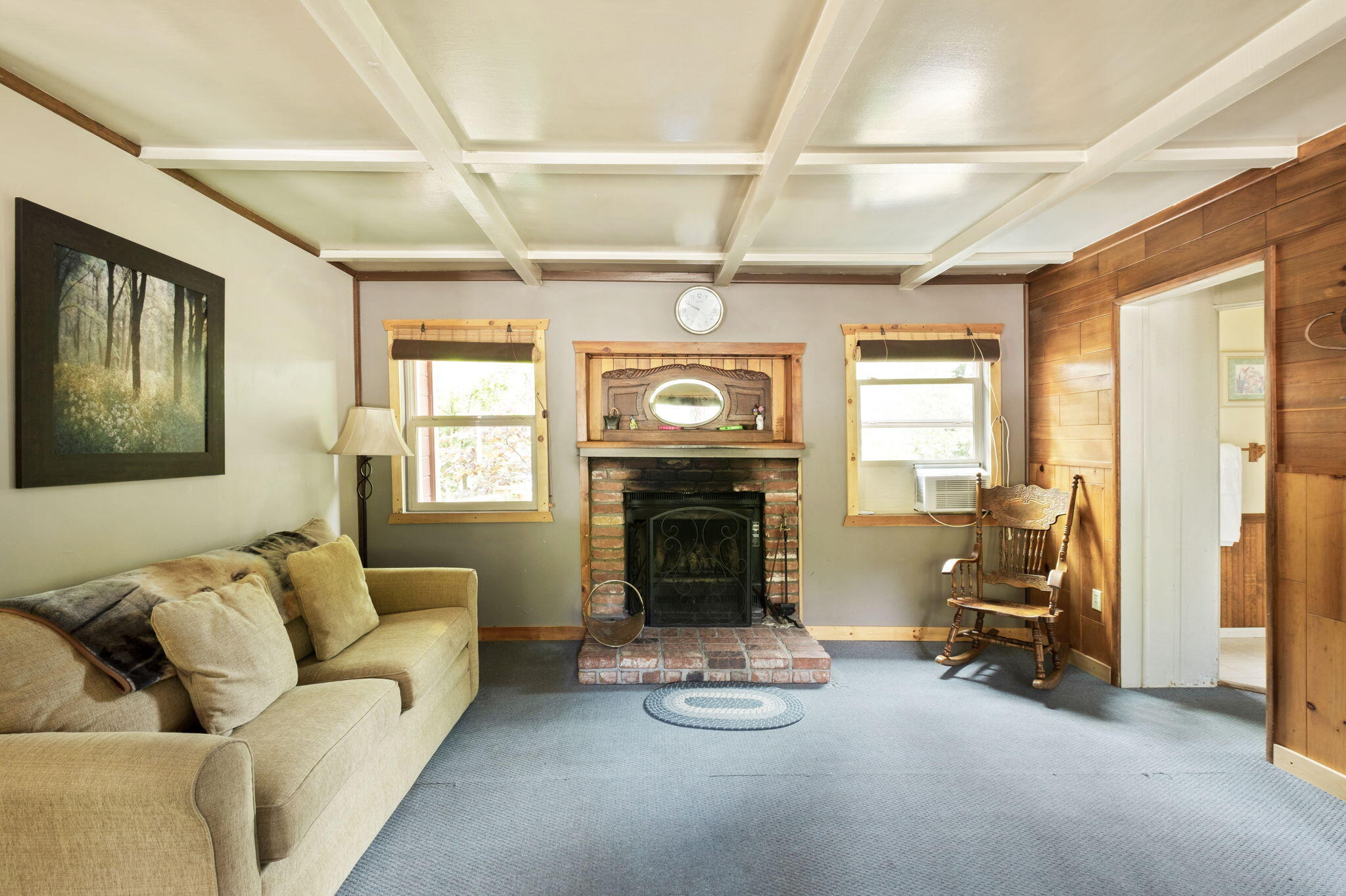 25210 Fern Valley Road Idyllwild, CA 92549 - Photo 85 of 127 a living room with furniture and a fireplace