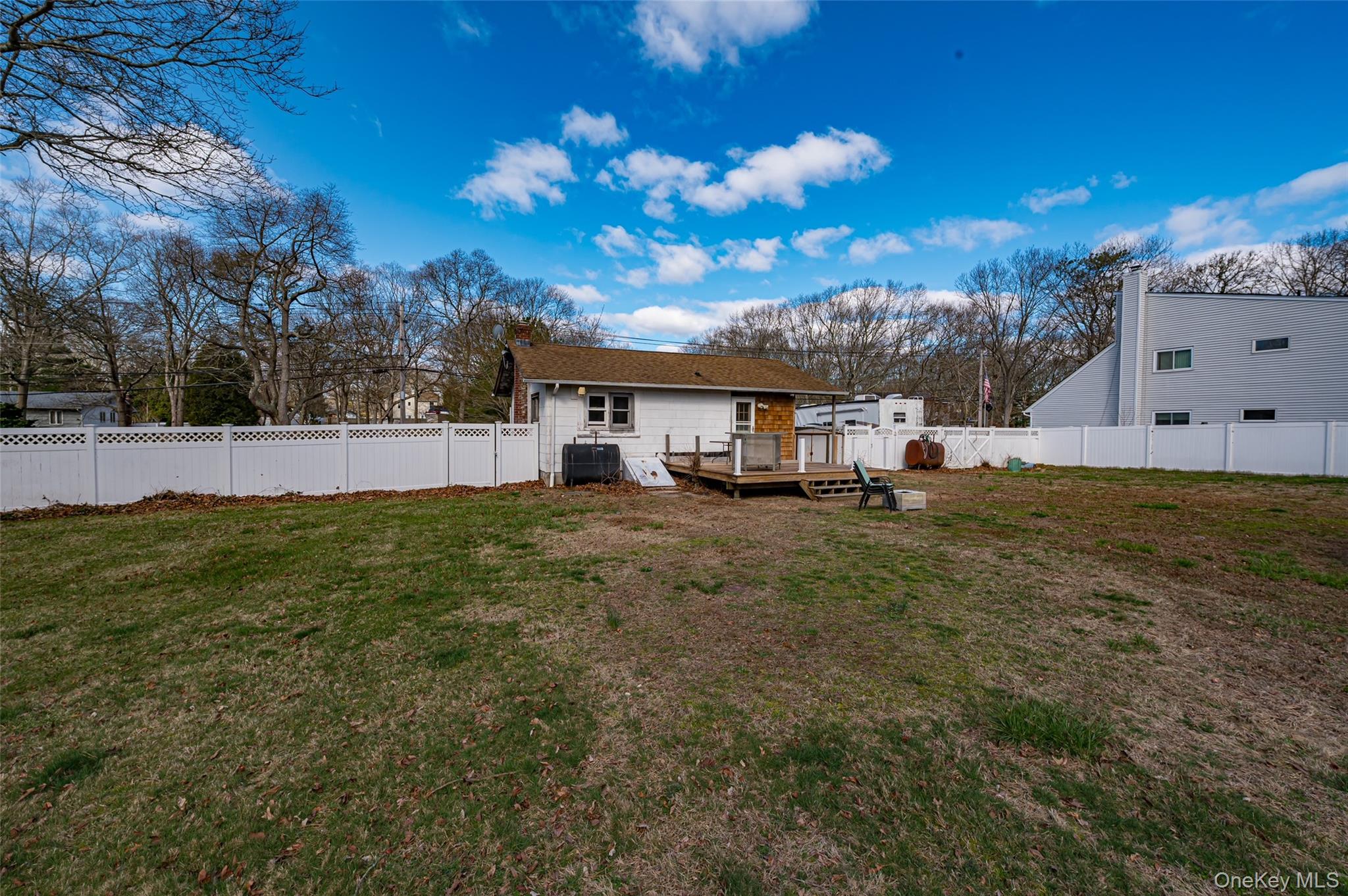 157 Hawthorne Street Mastic, NY 11950 - Photo 5 of 12 a view of a house with a yard