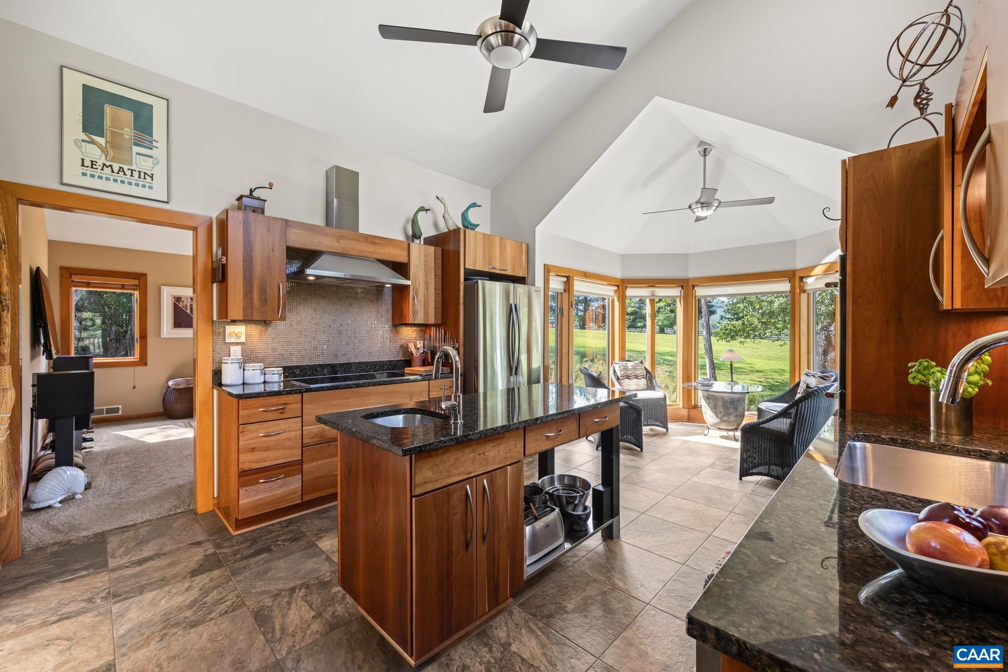 456 Roberts Mountain Road Faber, VA 22938 - Photo 16 of 59 a kitchen with stainless steel appliances granite countertop a stove oven and a sink with granite countertops