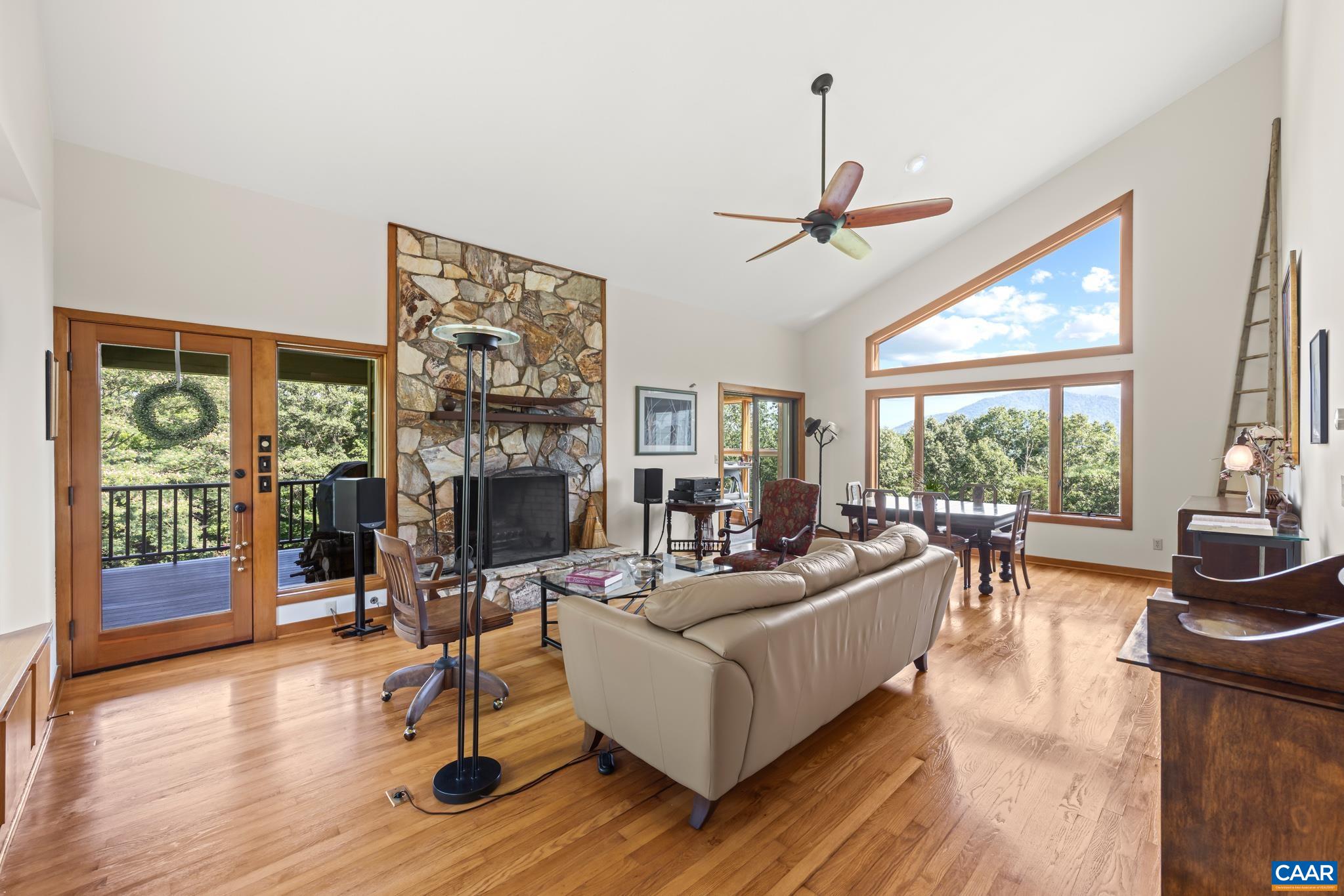 456 Roberts Mountain Road Faber, VA 22938 - Photo 23 of 59 a living room with fireplace furniture and a large window