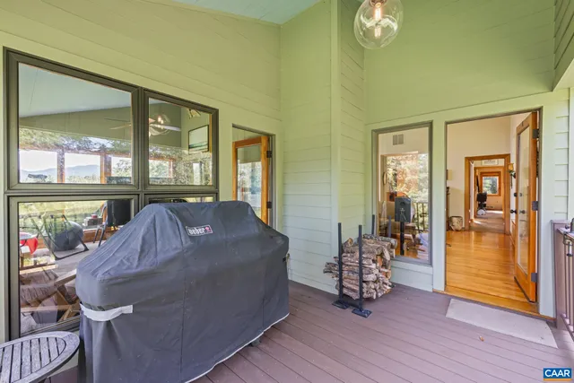 a view of balcony with furniture