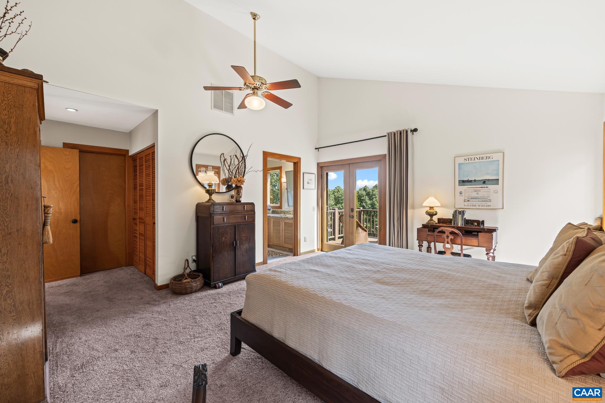 456 Roberts Mountain Road Faber, VA 22938 - Photo 33 of 59 a bed room with a bed and a large mirror