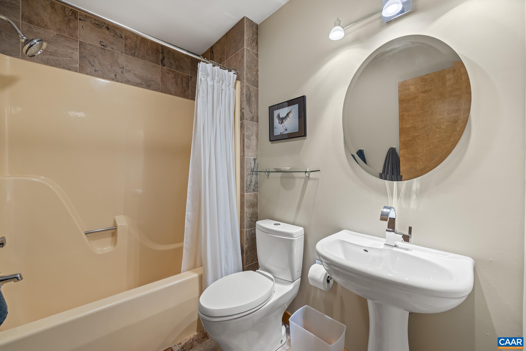 456 Roberts Mountain Road Faber, VA 22938 - Photo 42 of 59 a bathroom with a sink toilet and a mirror