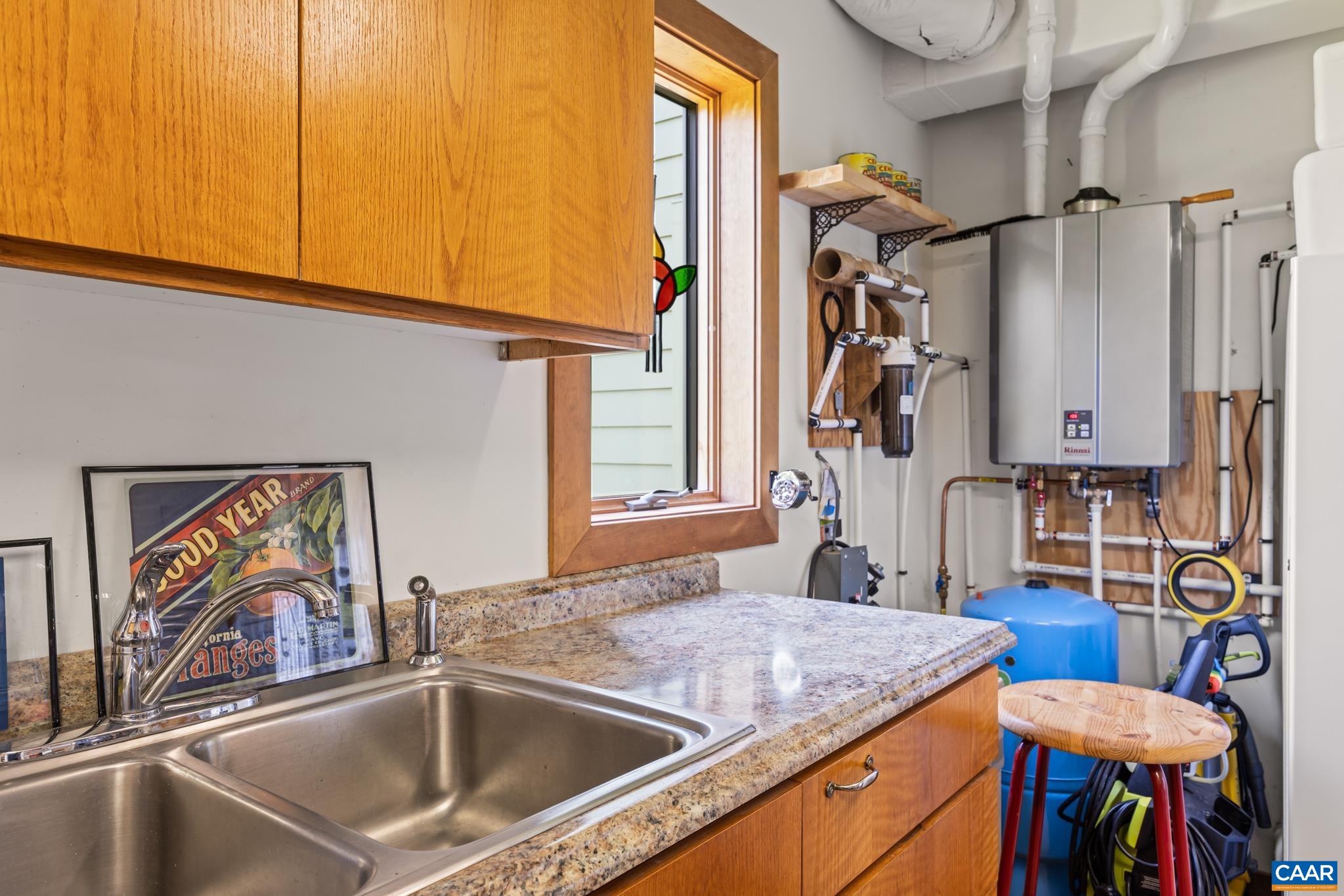 456 Roberts Mountain Road Faber, VA 22938 - Photo 46 of 59 a bathroom with a sink a mirror and a toilet