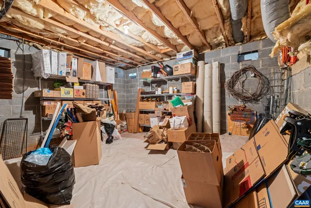 an aerial view of green landscape with trees houses and mountain view