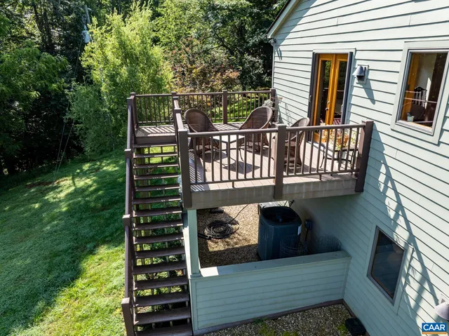 a view of a balcony with chairs