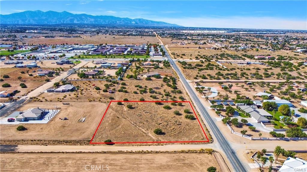 0 El Centro Road Oak Hills, CA 92344 - Photo 4 of 16 an aerial view of residential houses with outdoor space