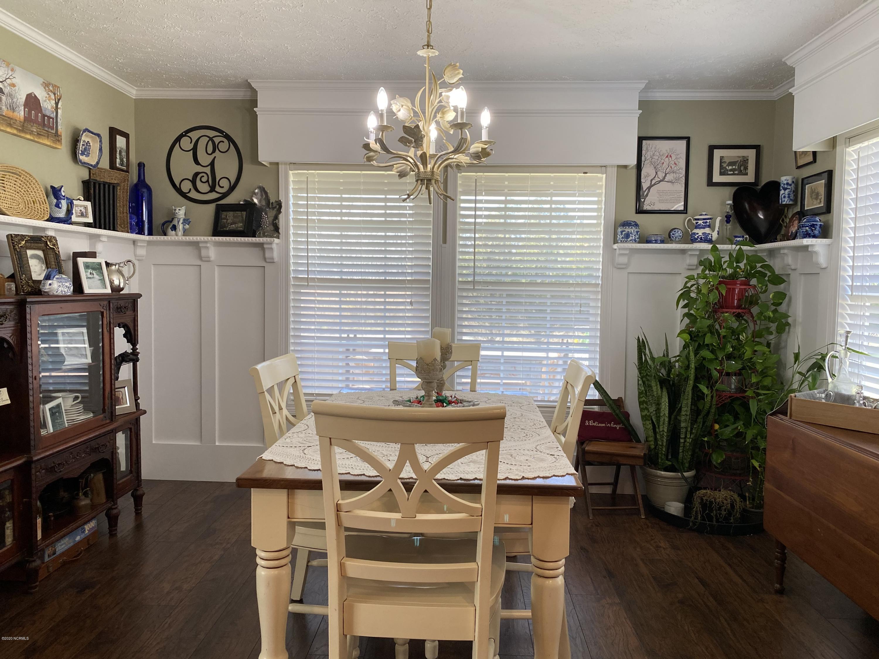 7022 Kingtown Road Northwest Ash, NC 28420 - Photo 14 of 34 The dining area is about 13' x 12'. Located in Ash NC, this home is close enough to coastal activities, yet secluded enough to give you room to spread out. Wilmington, NC is about an hour's drive form this property.