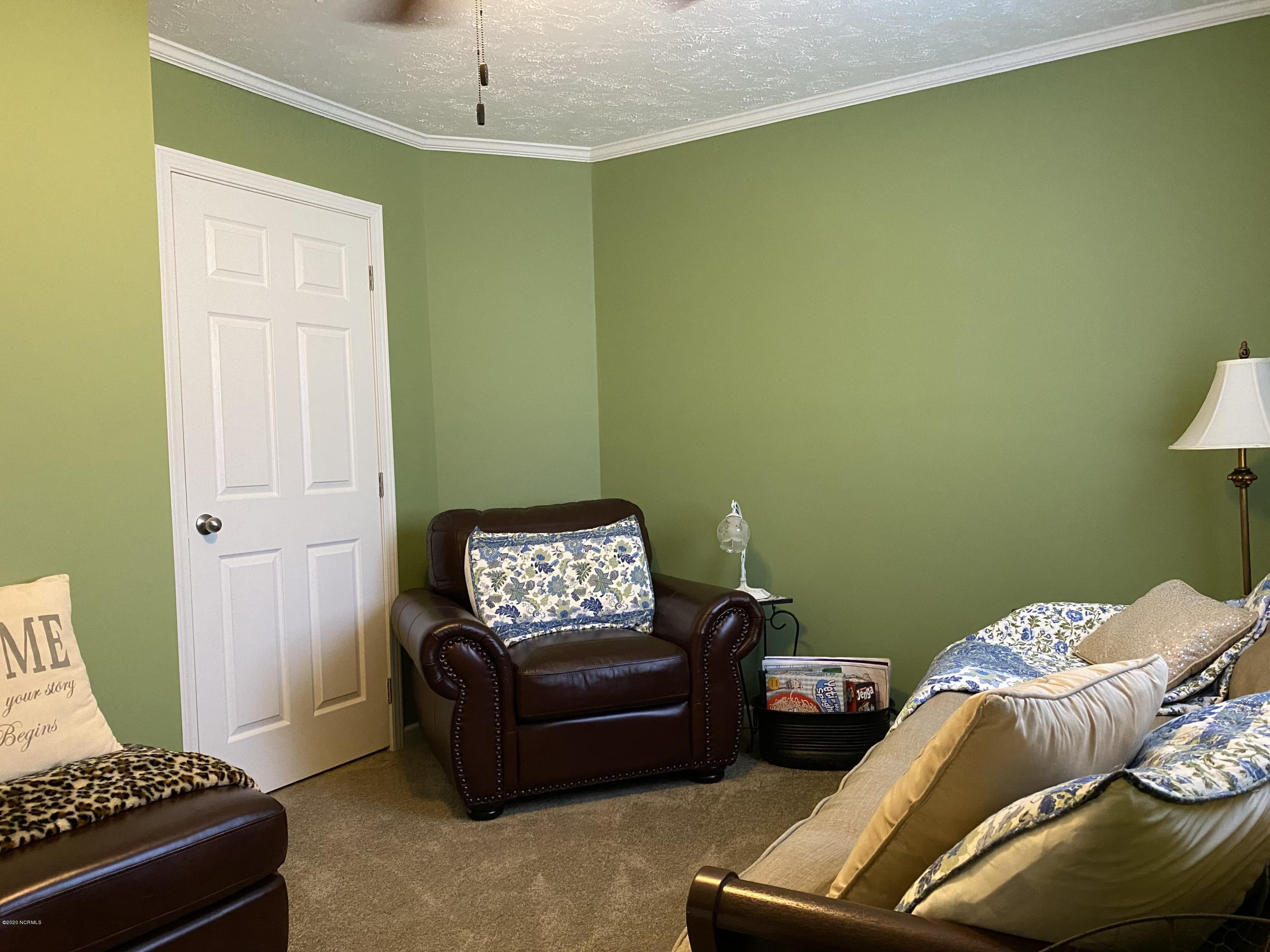 7022 Kingtown Road Northwest Ash, NC 28420 - Photo 21 of 34 This bedroom is about 13' by 9'.
