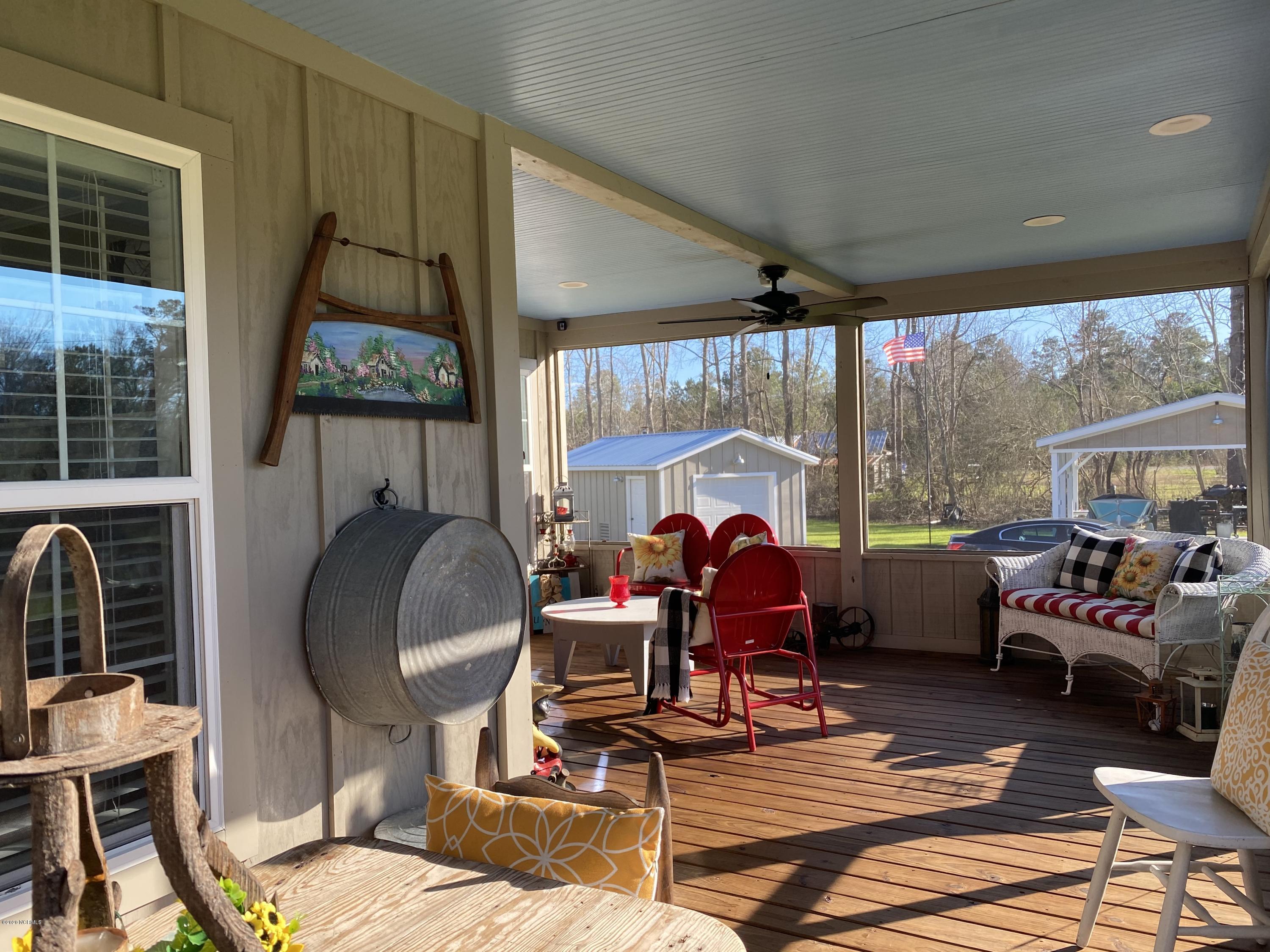 7022 Kingtown Road Northwest Ash, NC 28420 - Photo 3 of 34 With about 300 square feet of space, there is plenty of room to entertain on this front porch