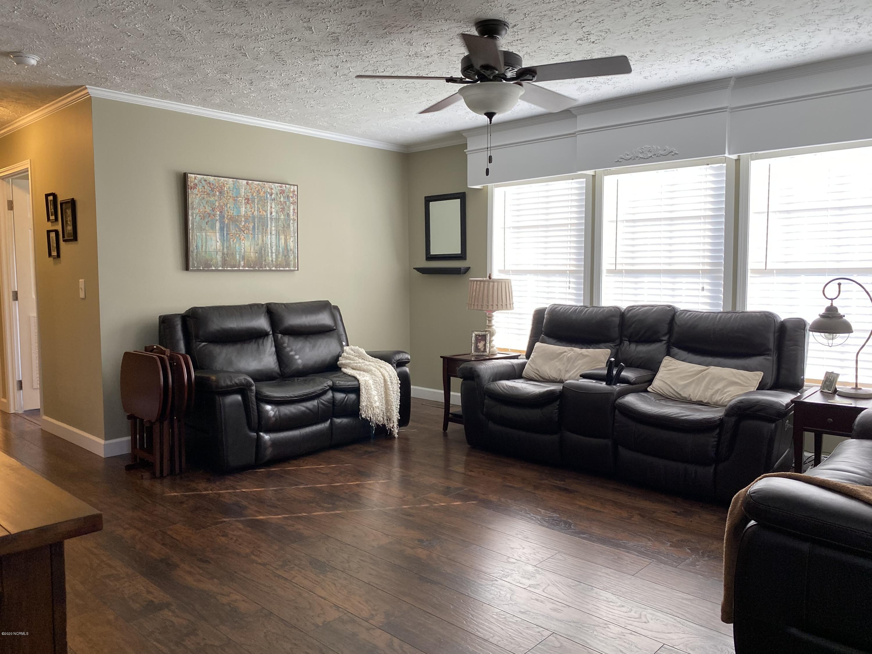 7022 Kingtown Road Northwest Ash, NC 28420 - Photo 5 of 34 Plenty of natural light drenches the Great Room
