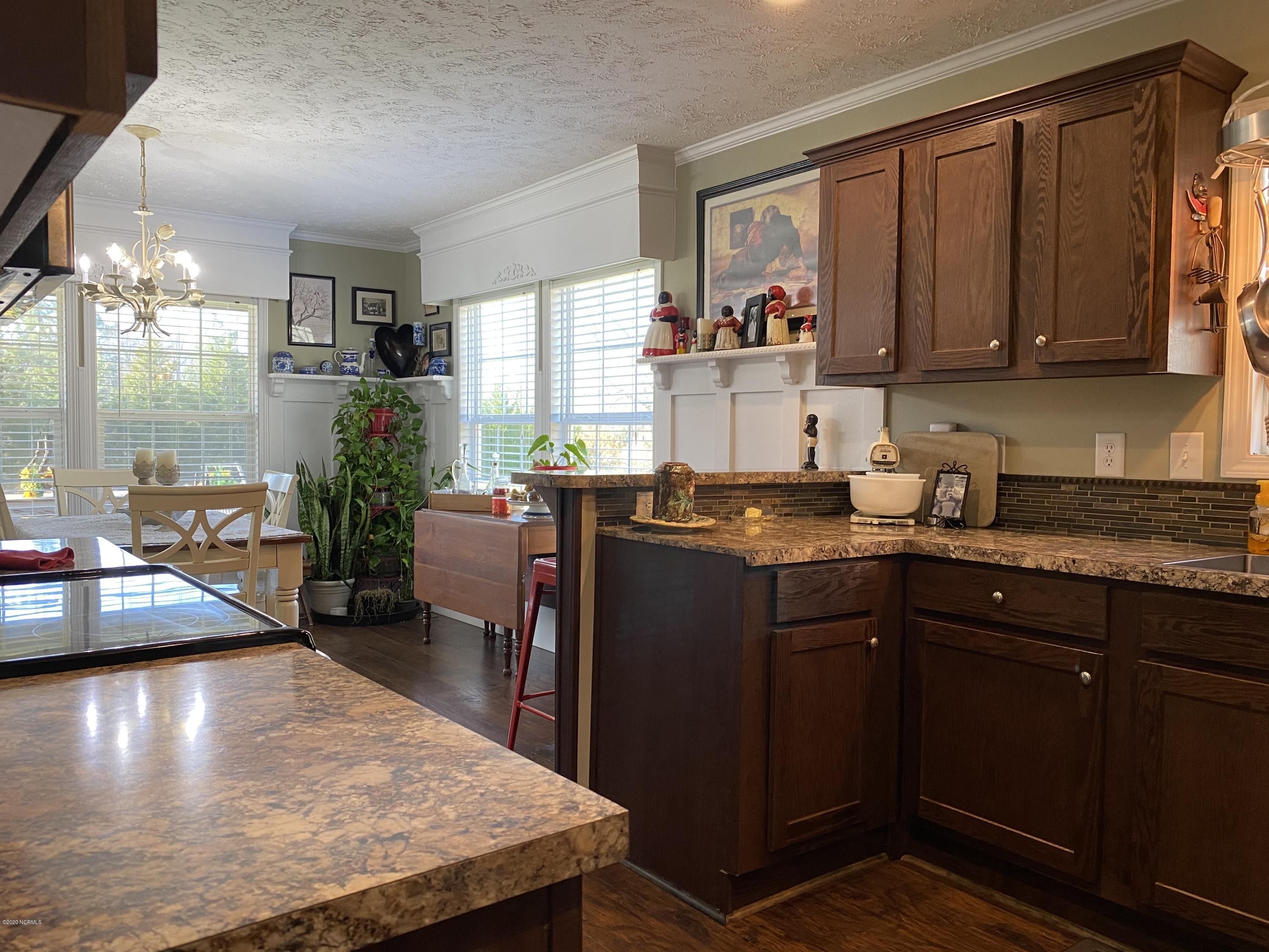 7022 Kingtown Road Northwest Ash, NC 28420 - Photo 10 of 34 This home was built with attentiveness to detail and quality with a generous amount of extras built in.