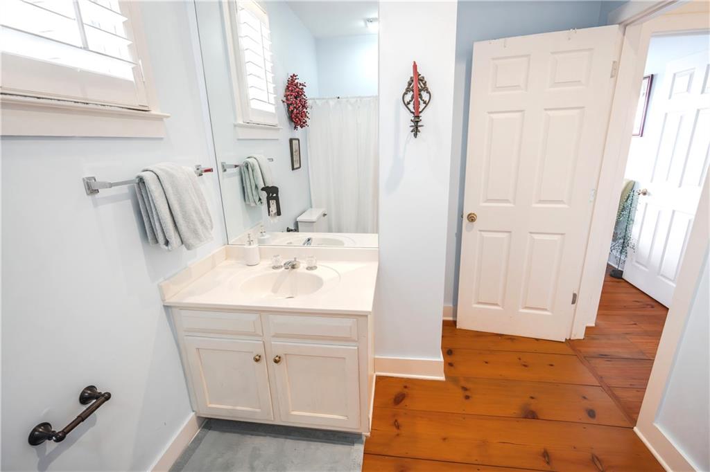 1911 Ridgeview Drive Jasper, GA 30143 - Photo 26 of 65 a bathroom with a sink and a mirror