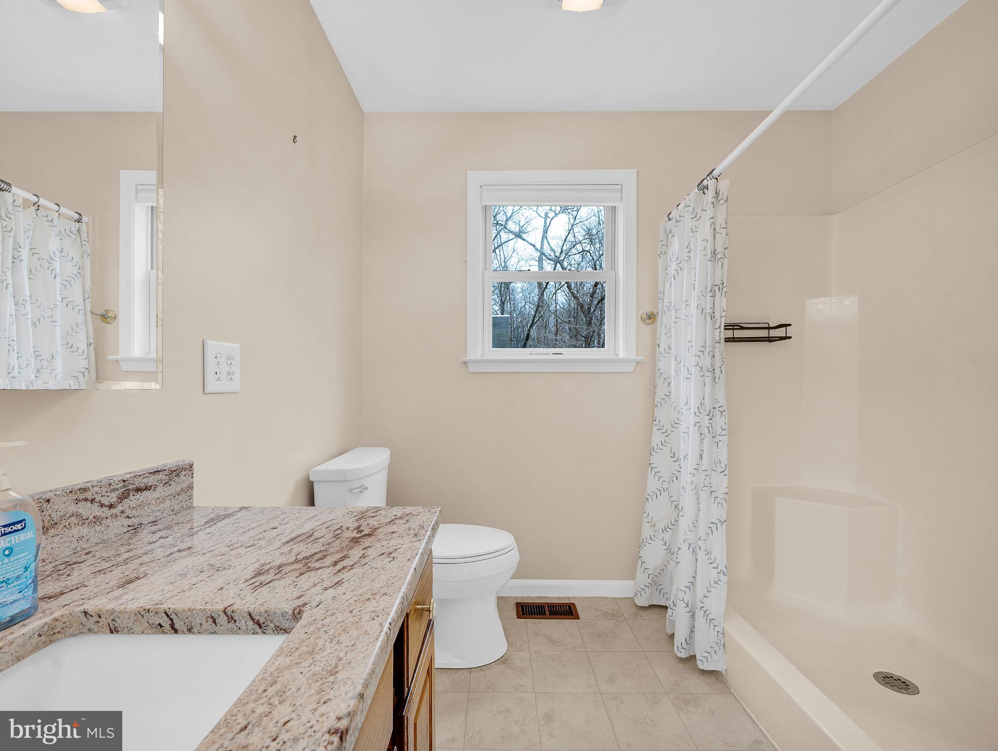1347 East Thatcher Road Quakertown, PA 18951 - Photo 22 of 47 Bright and airy bathroom with modern finishes.