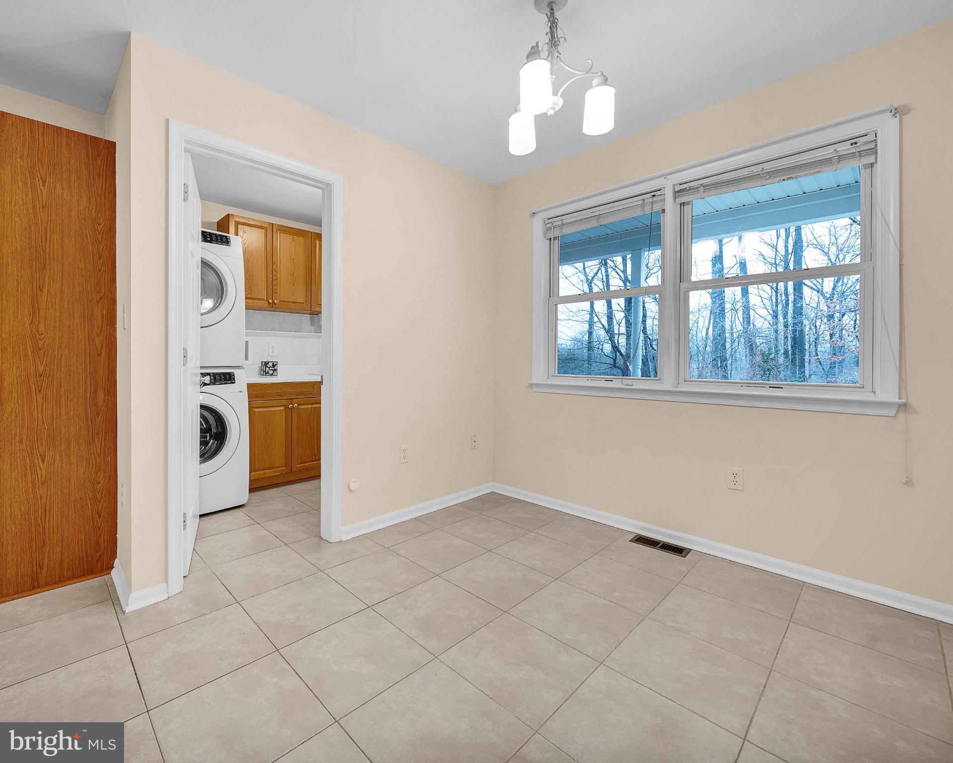 1347 East Thatcher Road Quakertown, PA 18951 - Photo 27 of 47 Bright and airy laundry nook with nature views.