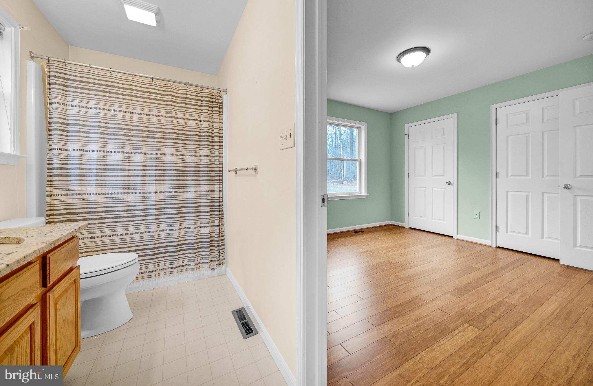 1347 East Thatcher Road Quakertown, PA 18951 - Photo 35 of 47 Bright and airy bathroom with adjoining room.