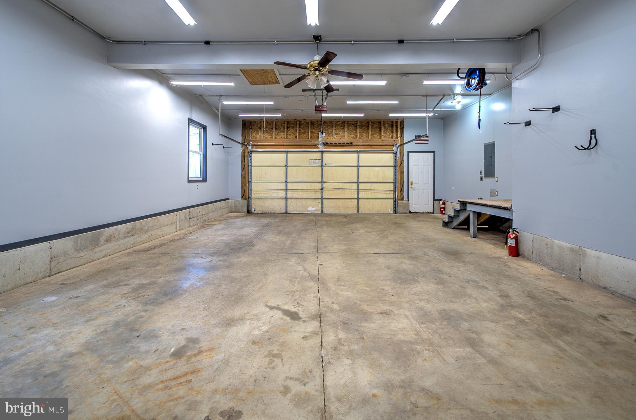 1347 East Thatcher Road Quakertown, PA 18951 - Photo 36 of 47 Spacious garage with modern amenities.