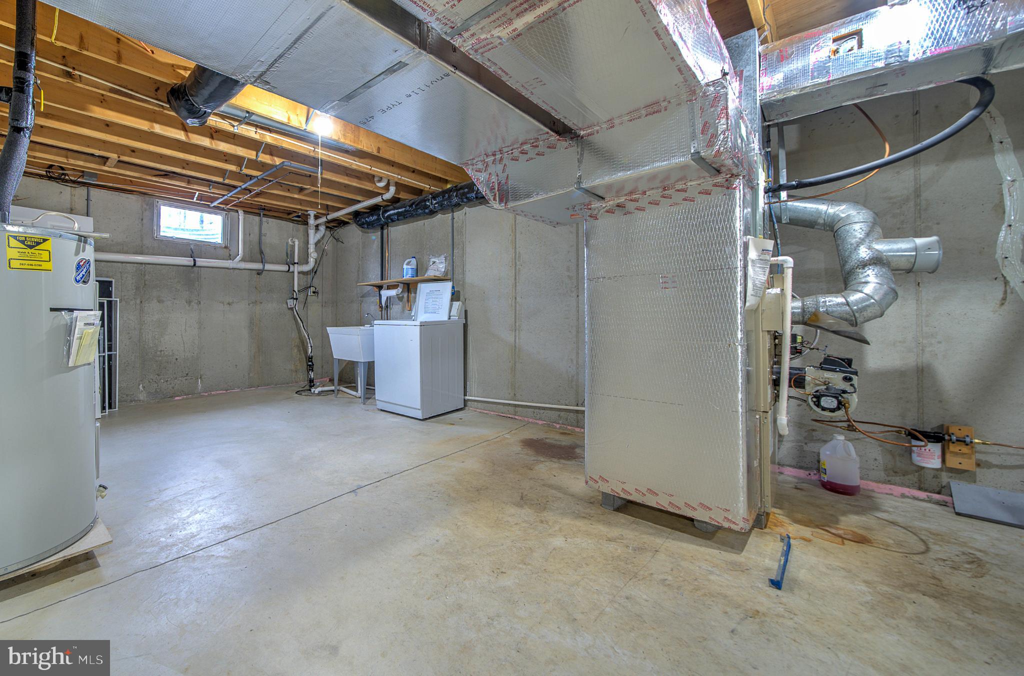 1347 East Thatcher Road Quakertown, PA 18951 - Photo 38 of 47 Spacious, unfinished basement ready for ideas.