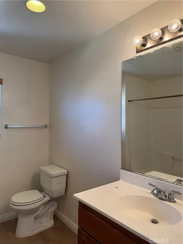 a bathroom with a sink and a vanity