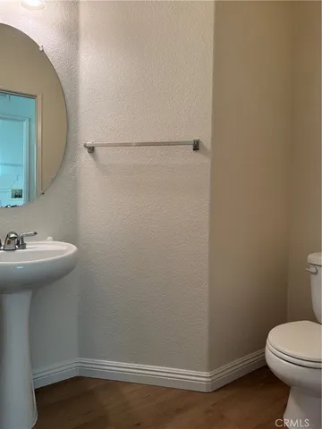 a bathroom with a sink and a toilet