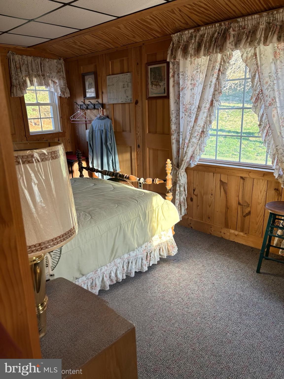 1315 1st Fork Road Austin, PA 16720 - Photo 19 of 25 a bed sitting in a room next to a window