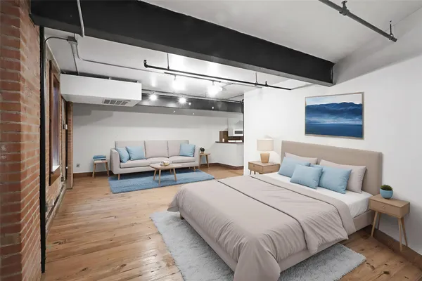 a bedroom with bed and window