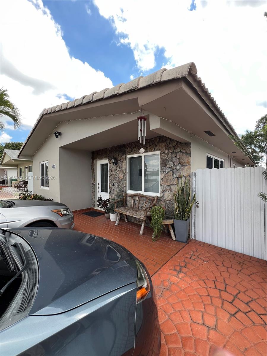a front view of a house with patio