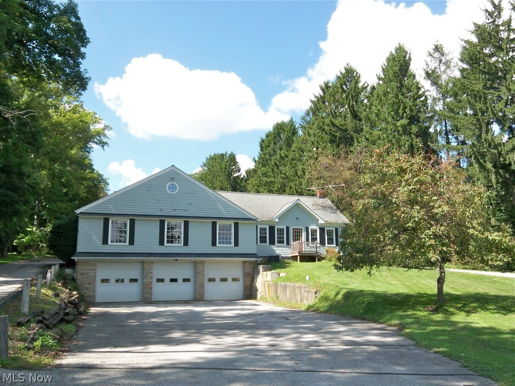 4160 Lander Road Chagrin Falls, OH 44022 - Photo 2 of 16 Front of home with 3 car garage on lower level.