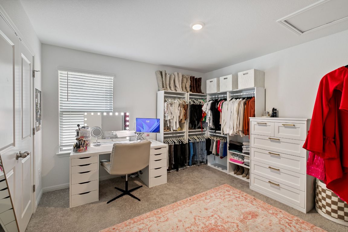 615 Backstays Loop Kyle, TX 78640 - Photo 23 of 36 a view of a bedroom with that has a bed and a window
