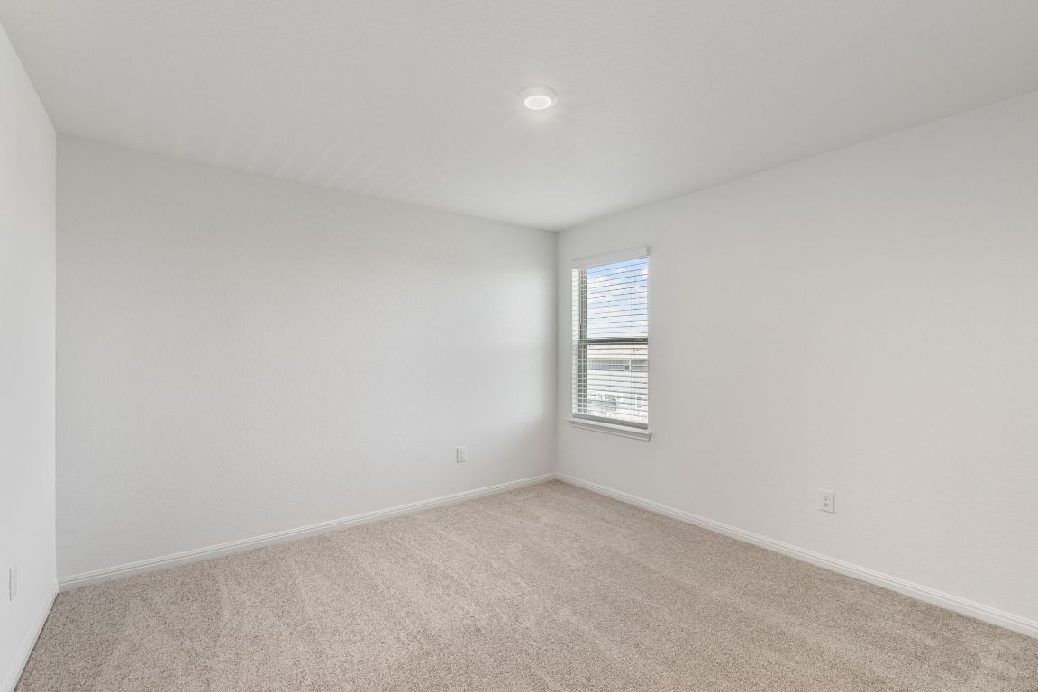 615 Backstays Loop Kyle, TX 78640 - Photo 27 of 36 an empty room with windows