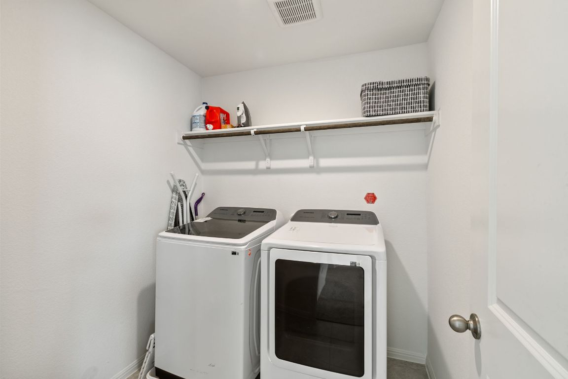 615 Backstays Loop Kyle, TX 78640 - Photo 32 of 36 a utility room with dryer and washer
