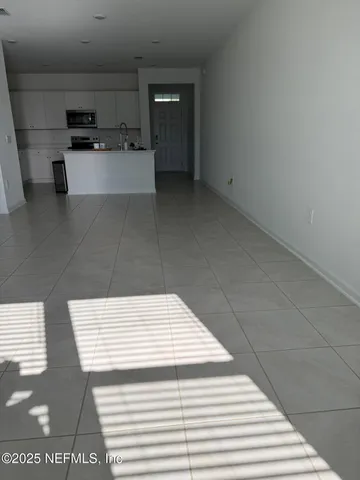 a bathroom with a sink toilet and a mirror