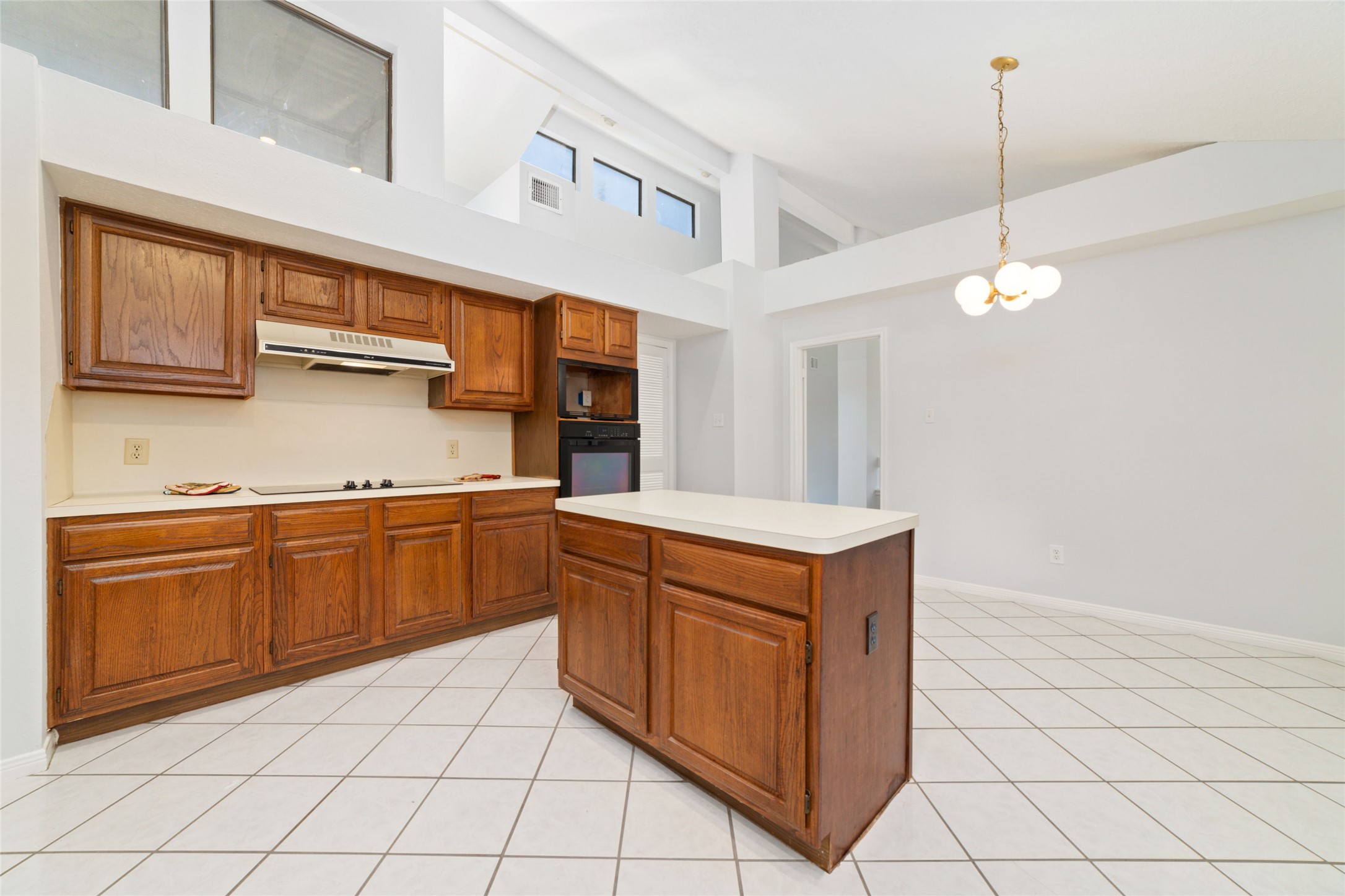 15014 Tinker Street Houston, TX 77084 - Photo 16 of 35 a kitchen with cabinets and appliances