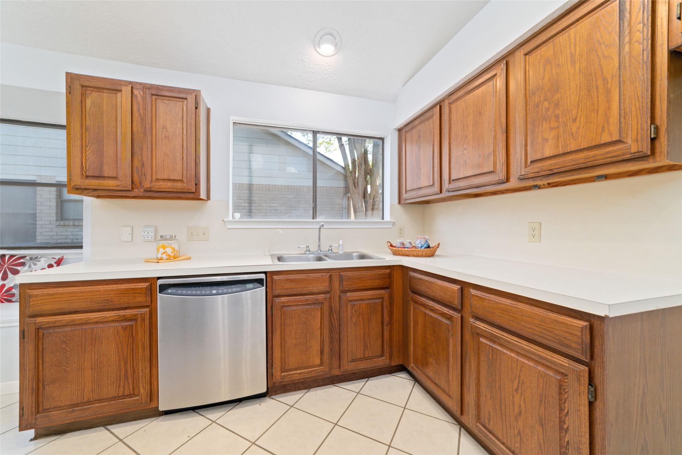 15014 Tinker Street Houston, TX 77084 - Photo 19 of 35 a kitchen with cabinets appliances and a sink
