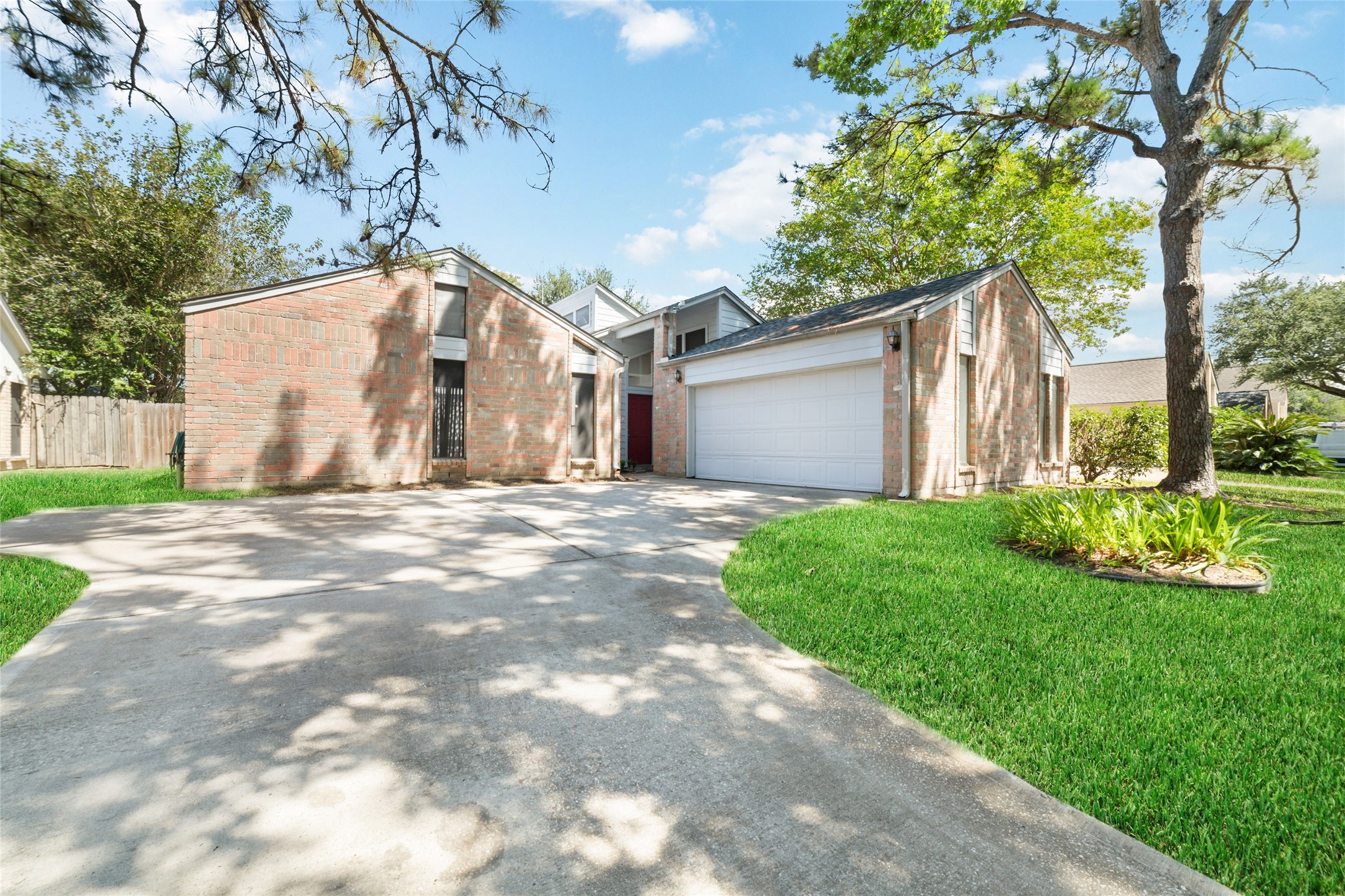 15014 Tinker Street Houston, TX 77084 - Photo 2 of 35 a view of a house with a yard