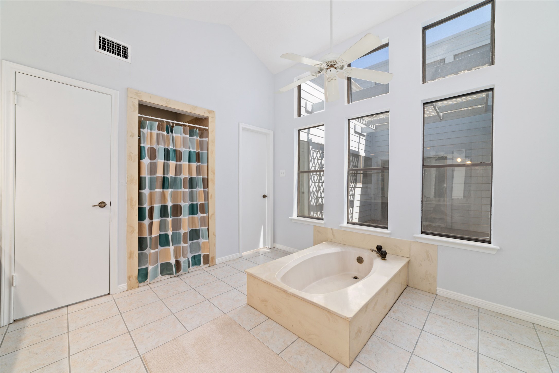15014 Tinker Street Houston, TX 77084 - Photo 27 of 35 a bathroom with a bathtub shower and a sink