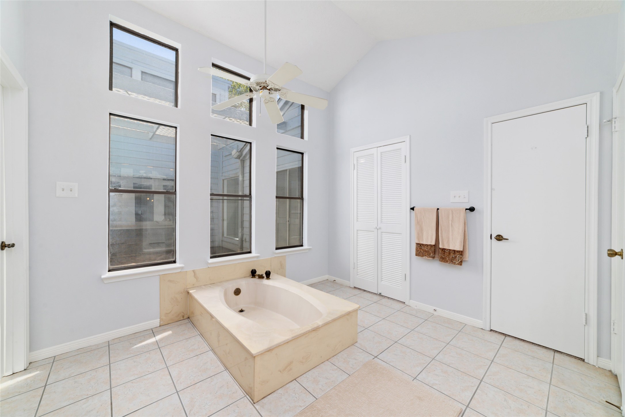 15014 Tinker Street Houston, TX 77084 - Photo 28 of 35 a bathroom with a bathtub and a shower