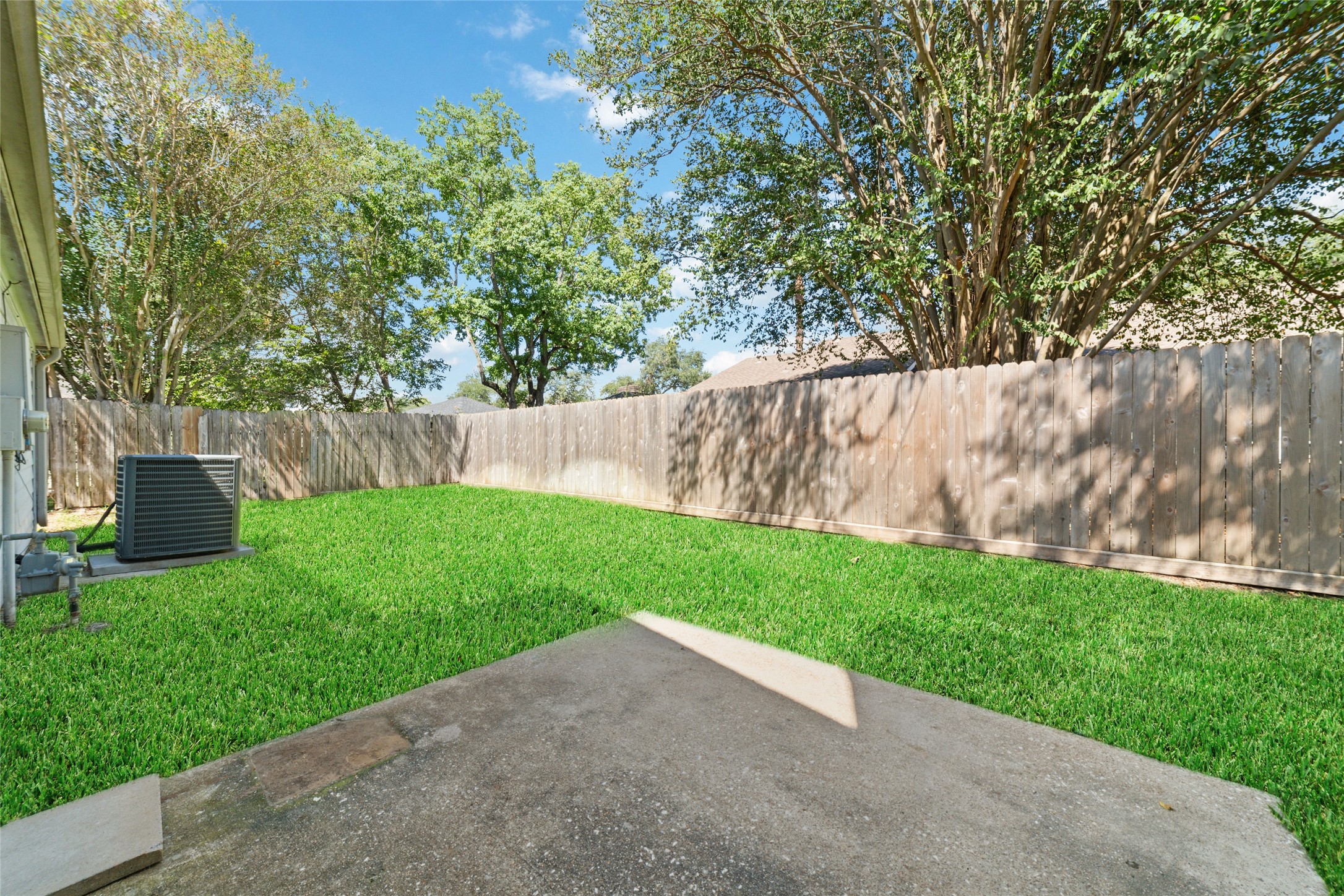 15014 Tinker Street Houston, TX 77084 - Photo 34 of 35 a view of a back yard