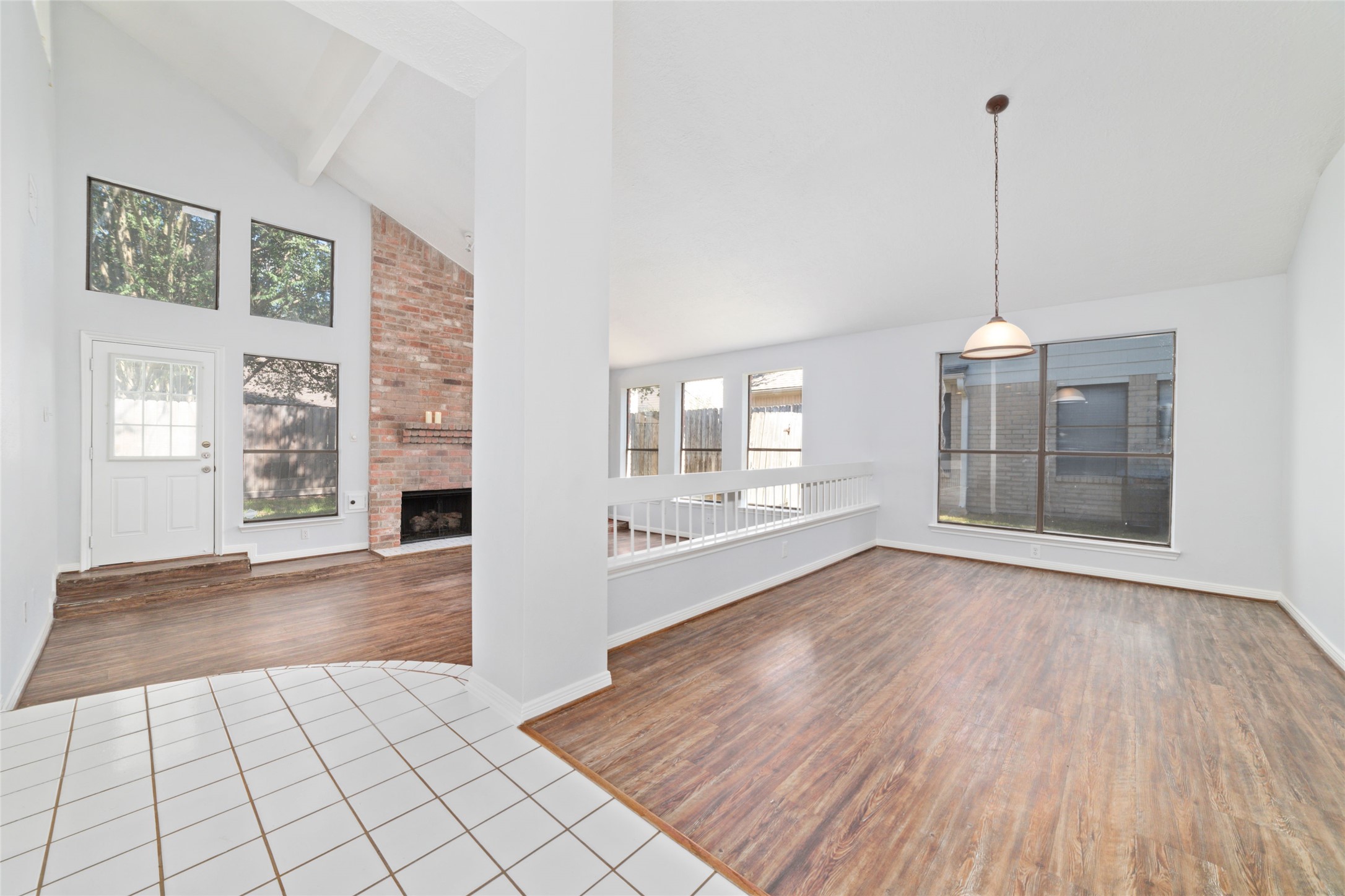 15014 Tinker Street Houston, TX 77084 - Photo 7 of 35 a view of an empty room with window and wooden floor