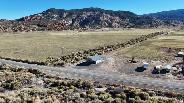 890 East Hatchery Road Bicknell, UT 84715 - Photo 21 of 48 View of mountain background with rural landscape