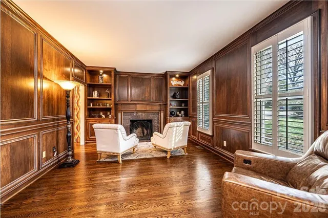 a room with furniture and a flat screen tv