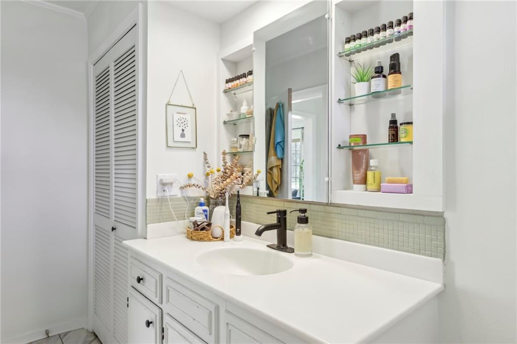 2263 Lovi Road Freedom, PA 15042 - Photo 15 of 22 a bathroom with a sink and a mirror