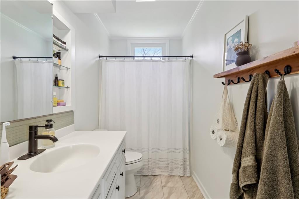 2263 Lovi Road Freedom, PA 15042 - Photo 16 of 22 a bathroom with a sink toilet and shower