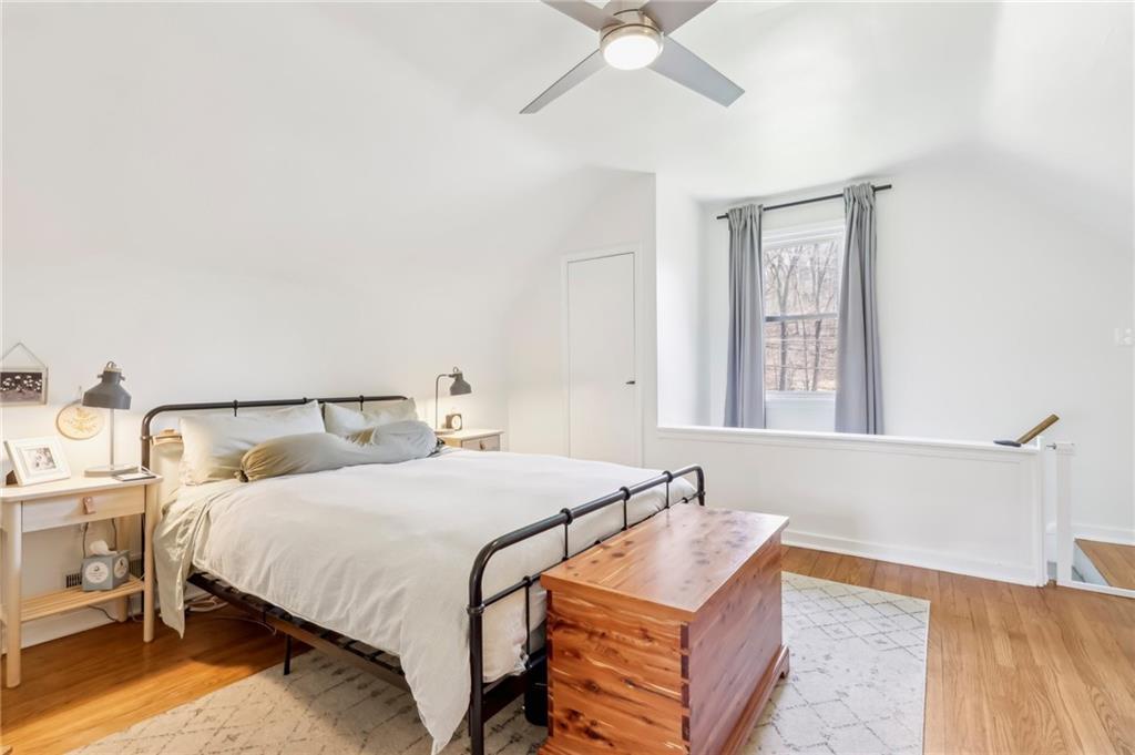 2263 Lovi Road Freedom, PA 15042 - Photo 19 of 22 a bedroom with a bed and a chandelier