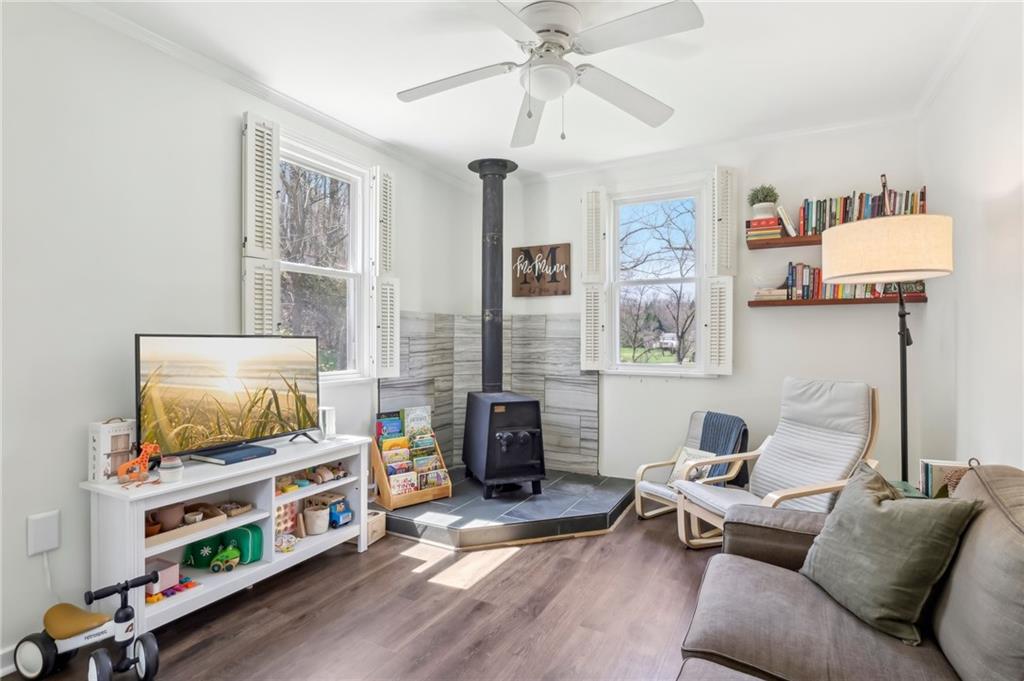 2263 Lovi Road Freedom, PA 15042 - Photo 9 of 22 a living room with furniture and a flat screen tv