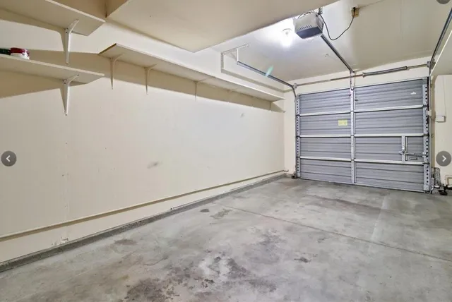 a aerial view of a house with a swimming pool