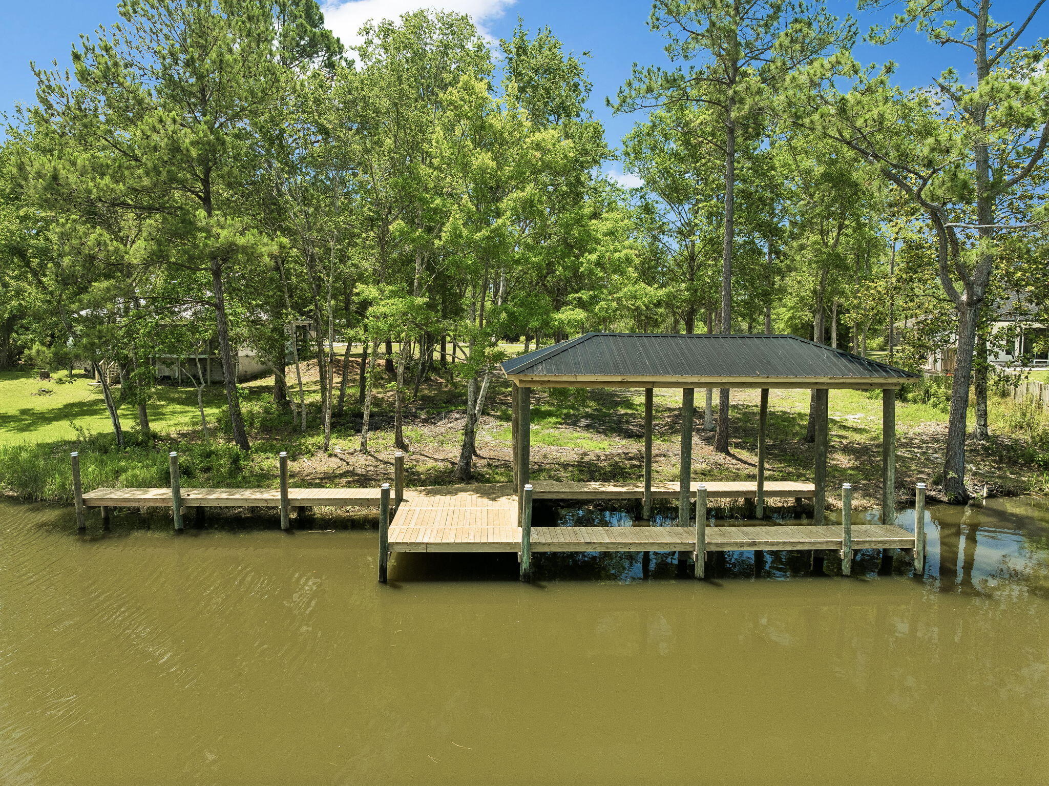 92 Waterside Lane Freeport, FL 32439 - Photo 15 of 28 a view of swimming pool with outdoor seating and lake view