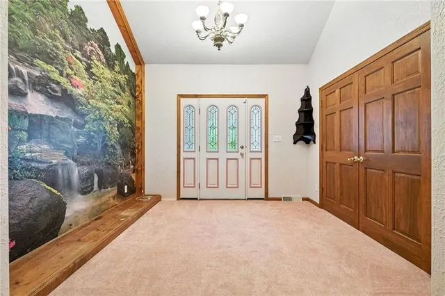 a view of a room with a large window