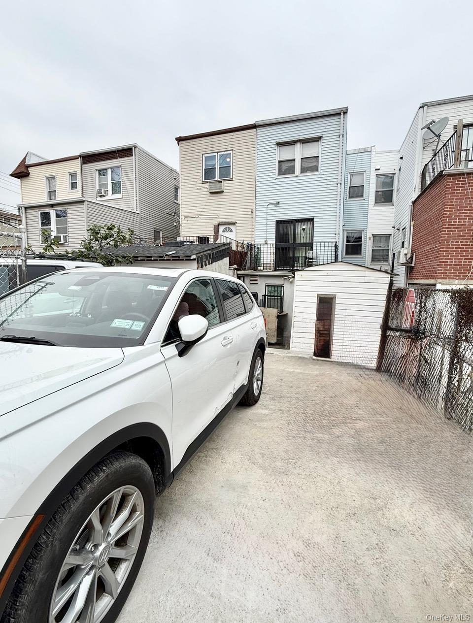 98-08 Alstyne Avenue Queens, NY 11368 - Photo 6 of 7 a kitchen with a stove and a sink