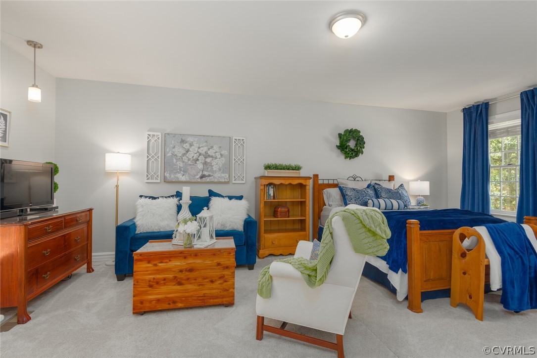 9121 Cardiff Road North Chesterfield, VA 23236 - Photo 24 of 50 a bedroom with furniture and a bed